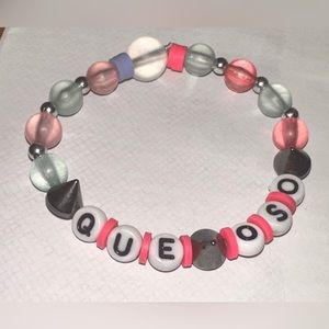 stretchy handmade friendship bracelet with glass beads “que oso” and studs